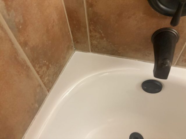 bathtub chip repair after the repair and radius refinishing